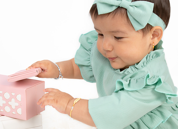 Example Bracelet Shown in 14K <u>Yellow</u> Gold on 1 Year Old Girl
