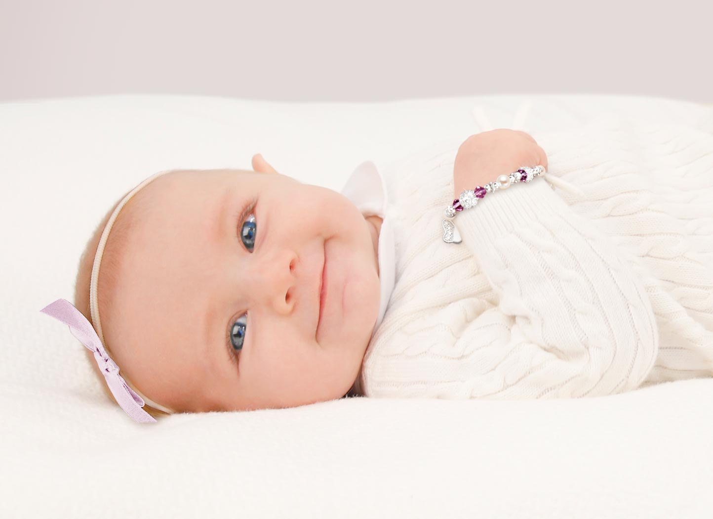 February Birthstone Example Bracelet Shown on Baby Girl<br /> 