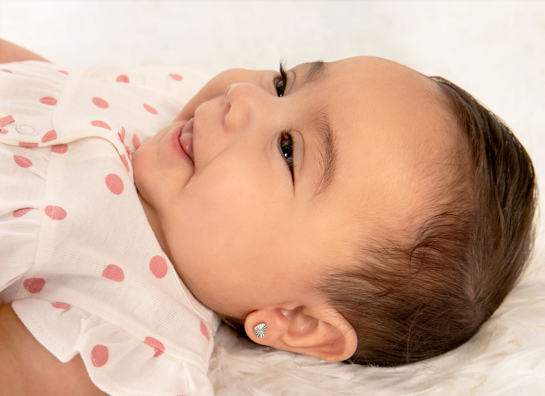 Earring Shown on Infant Girl