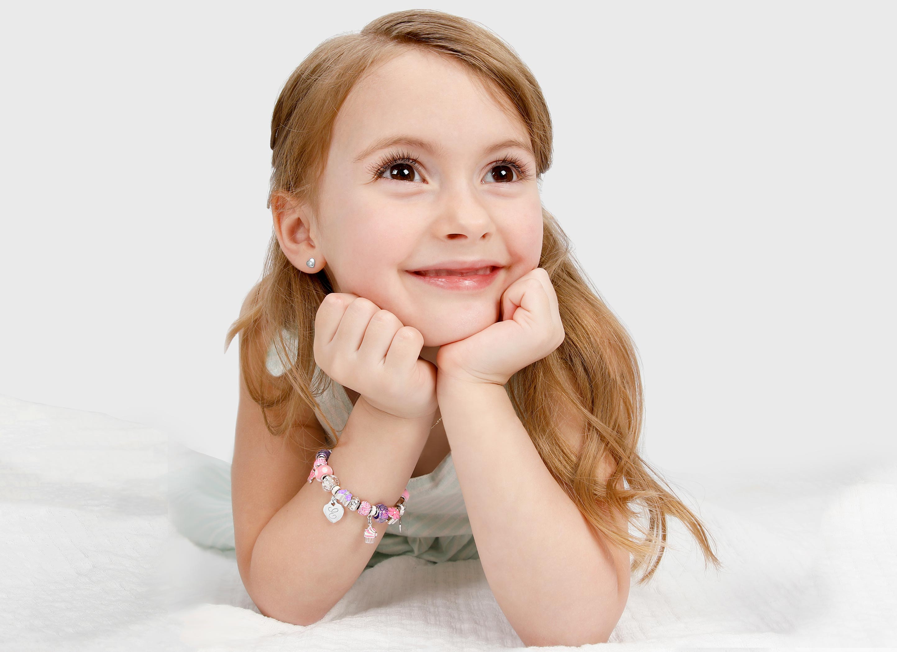 Adoré™ Charm Shown on Child Model