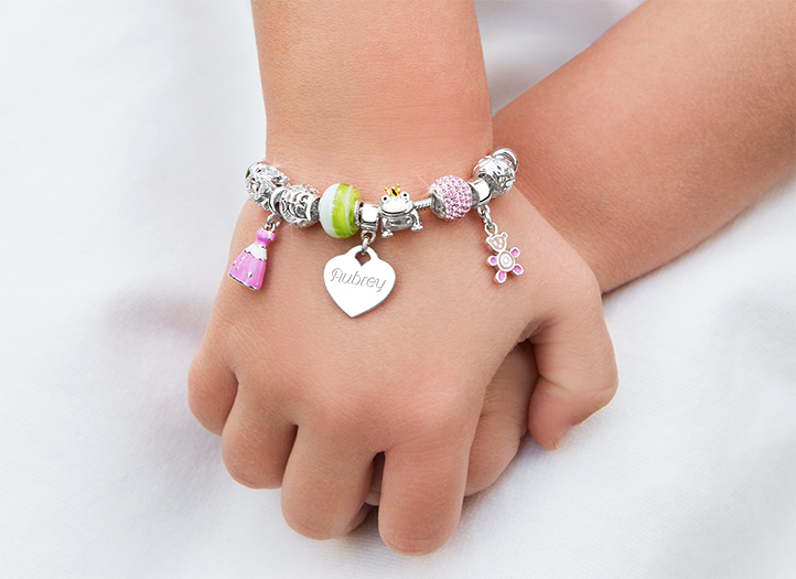 Adoré&trade; Charm Shown on Child Model
