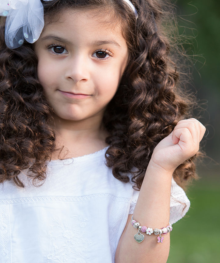 Adoré™ Charm Shown on Child Model