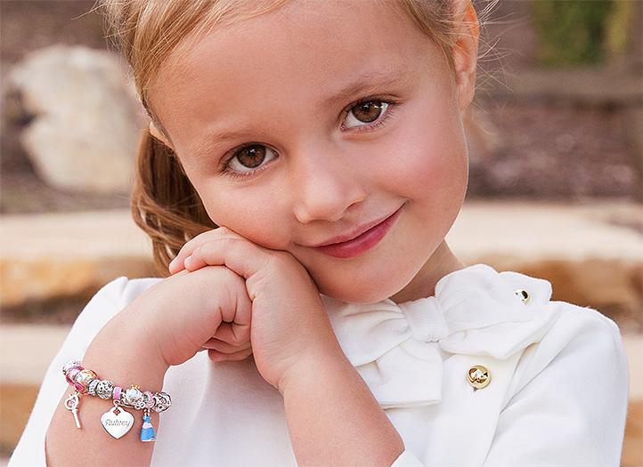 Adoré&trade; Charm Shown on Child Model
