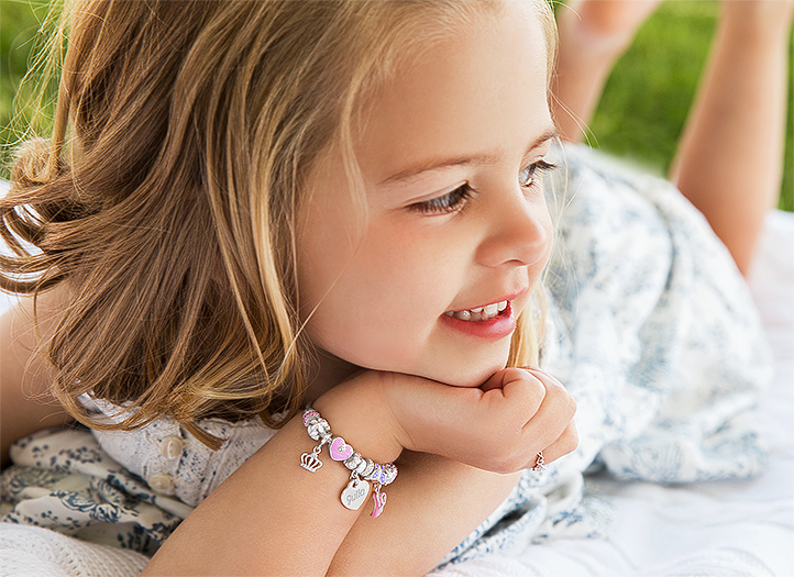 Adoré&trade; Charm Shown on Child Model
