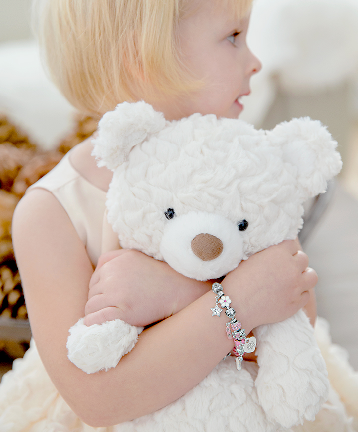 Adoré&trade; Charm Shown on Child Model
