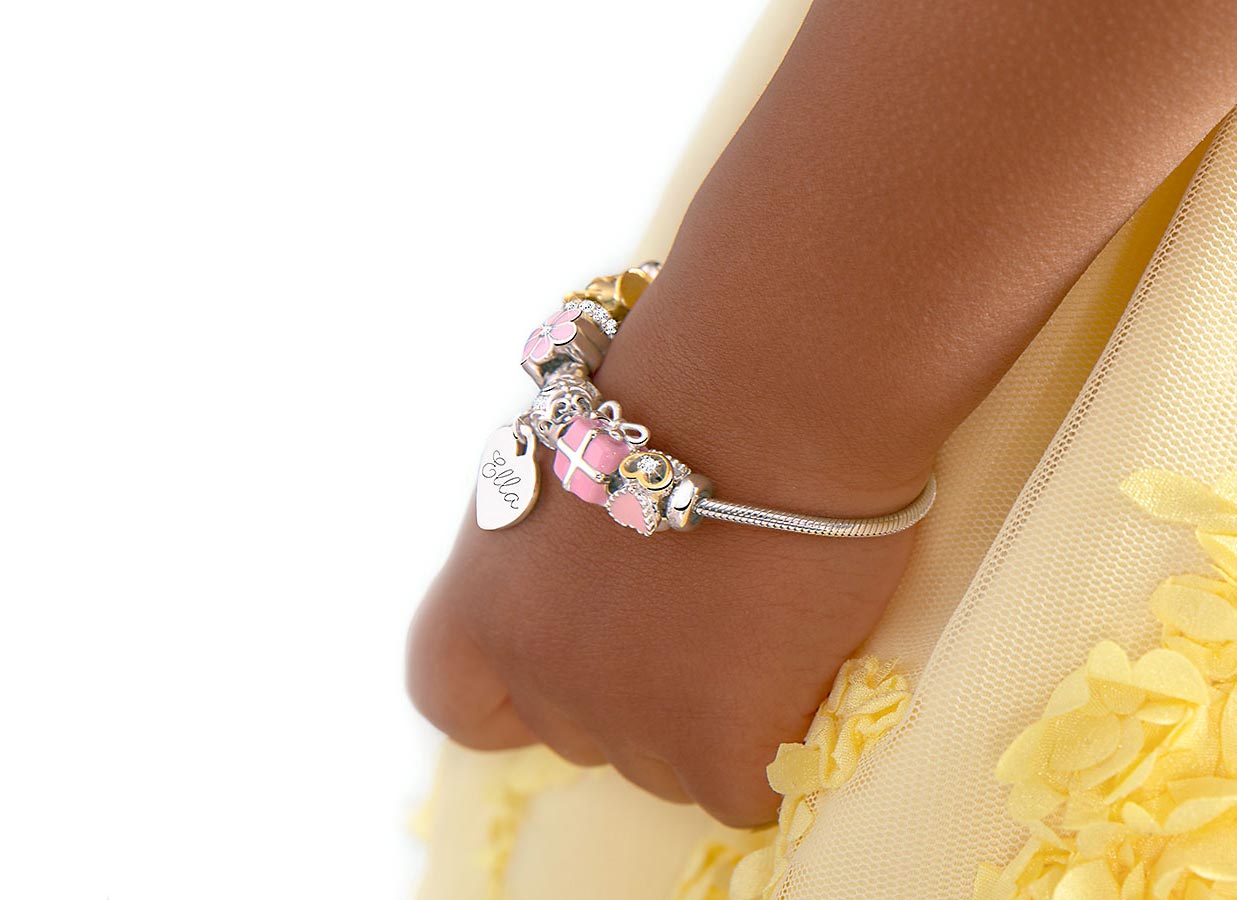 Adoré&trade; Charm Shown on Child Model