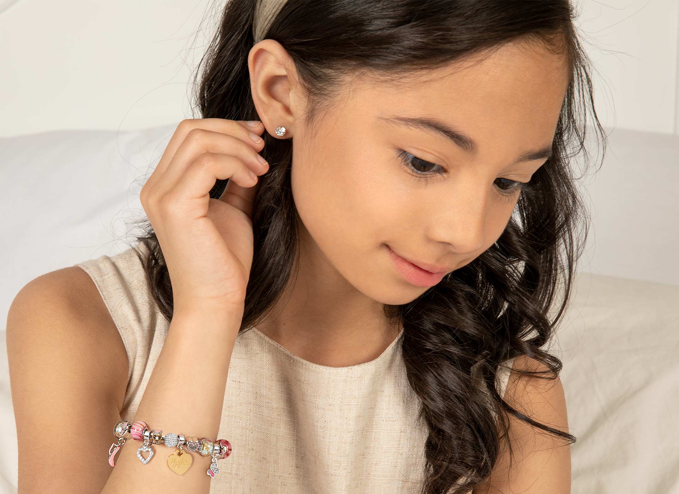 Adoré&trade; Charm Shown on Child Model