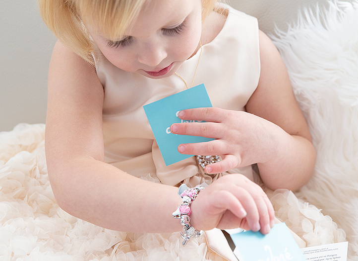 Adoré&trade; Charm Shown on Child Model
