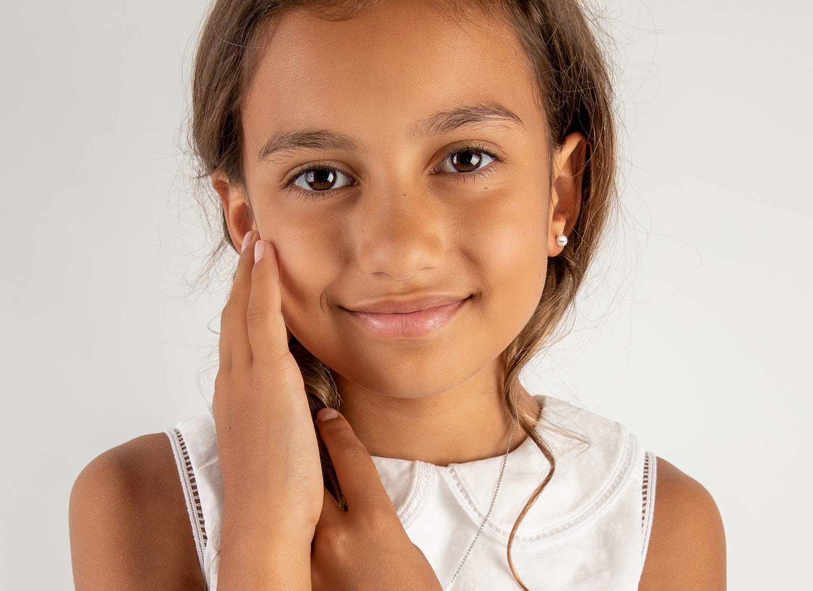 Earring Shown on 8 Year Old Girl
