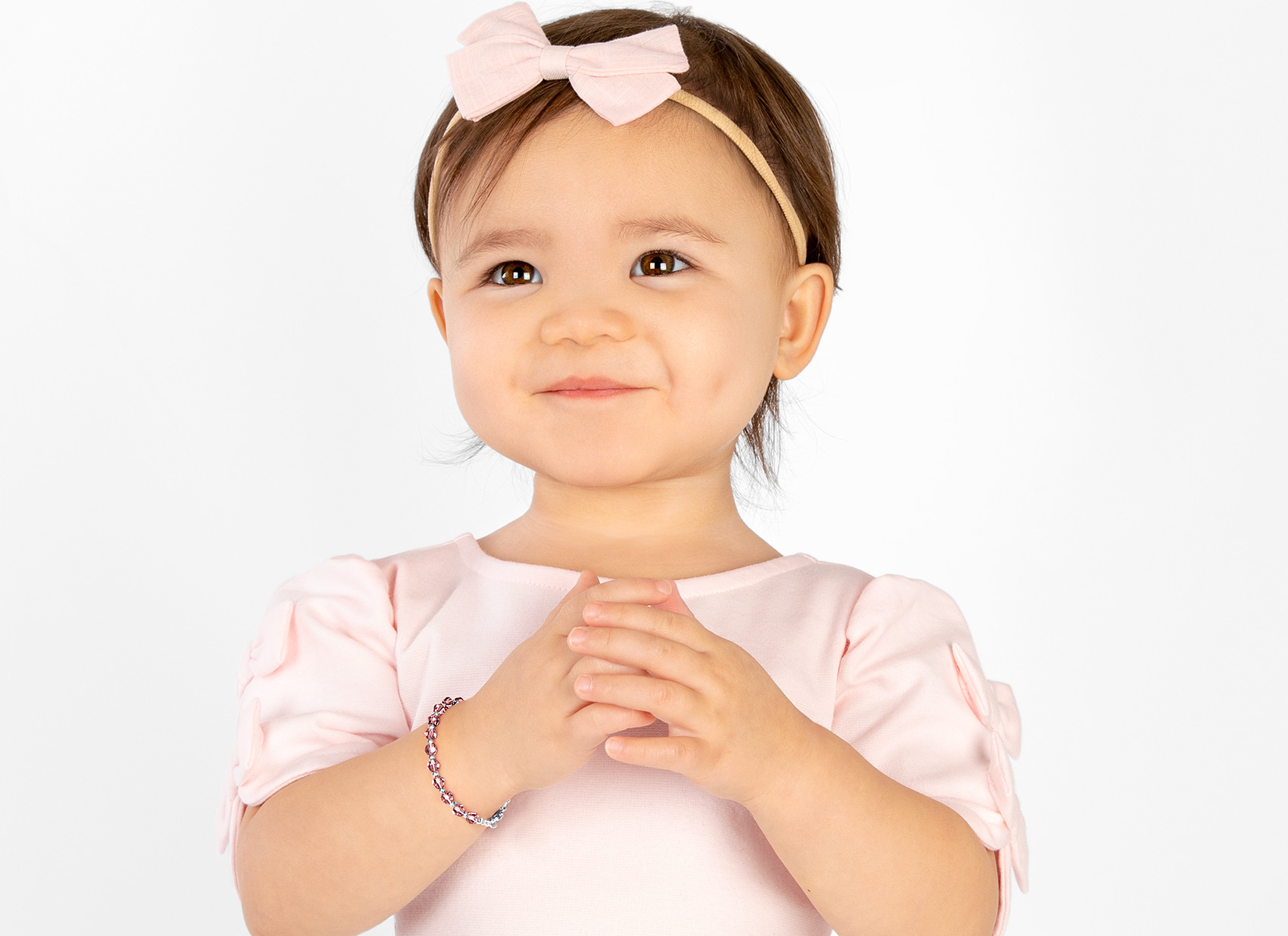 February Birthstone Example Bracelet Shown on 2 Year Old Girl