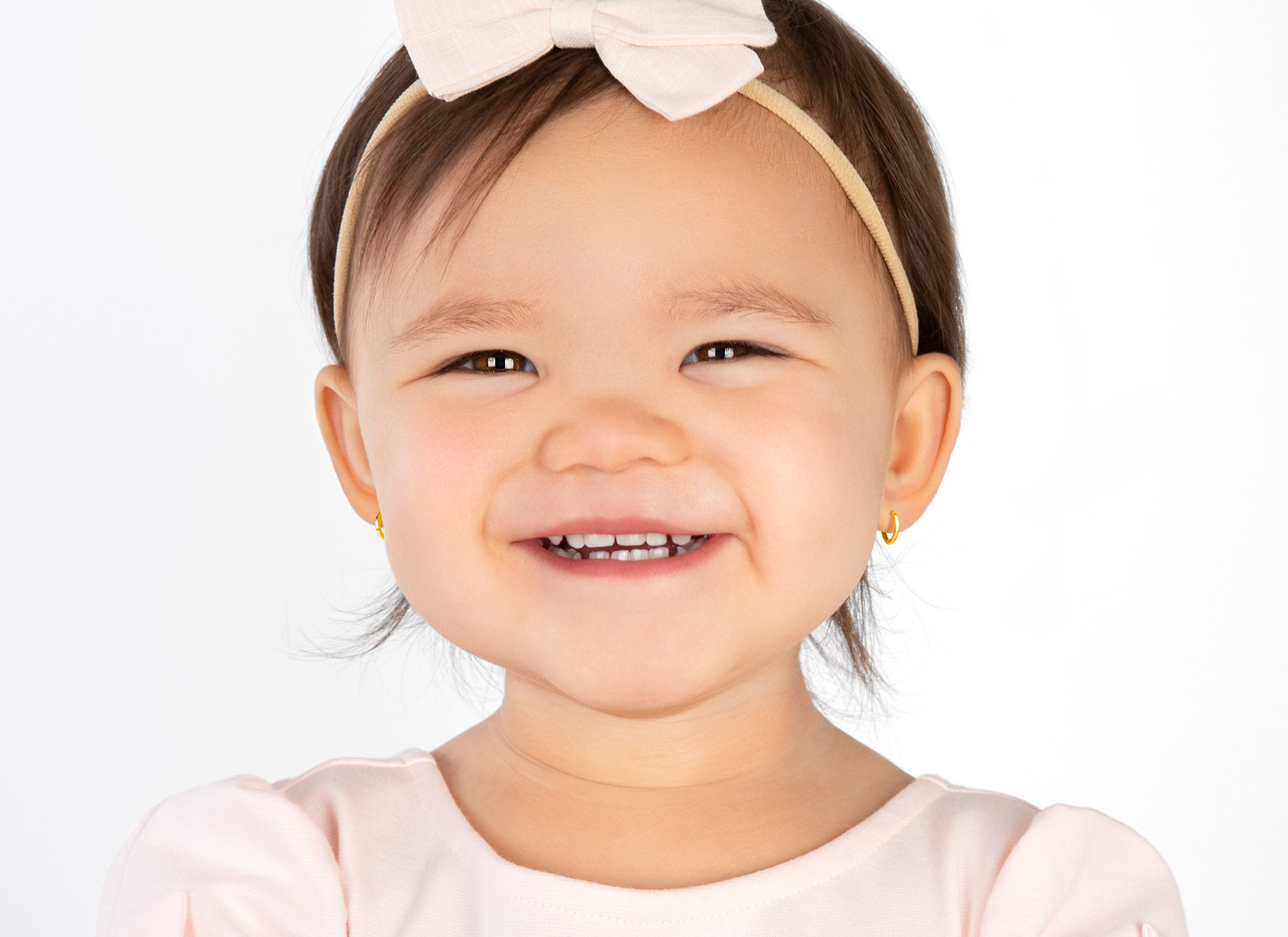 Earring Shown on 1 Year Old Girl