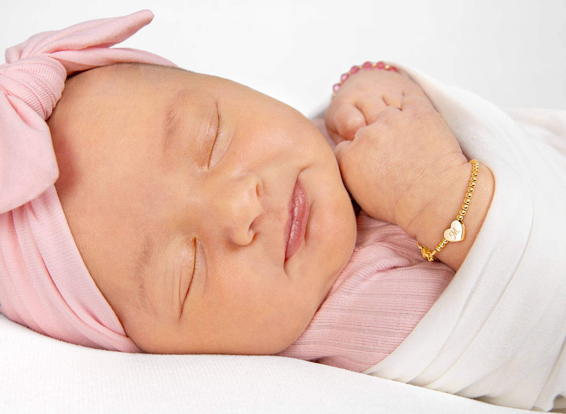 Example Bracelet Shown on Newborn Girl