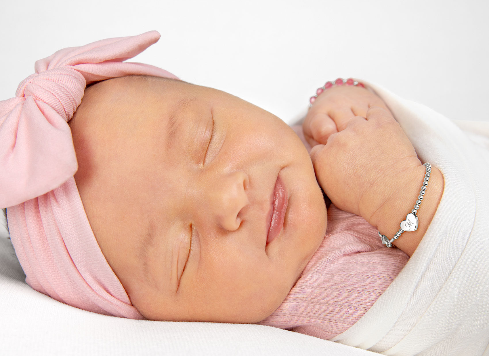 Example Bracelet Shown on Newborn Girl