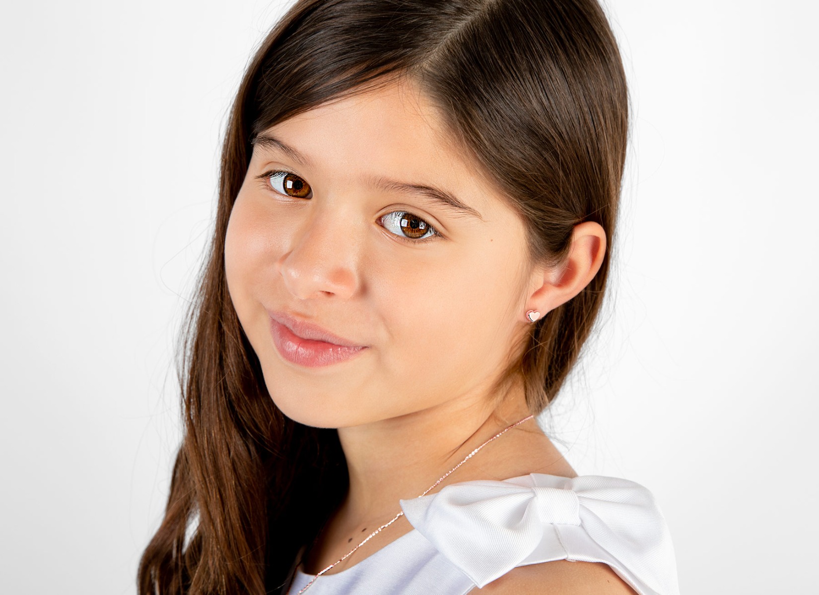 Earring Shown on 9 Year Old Girl 