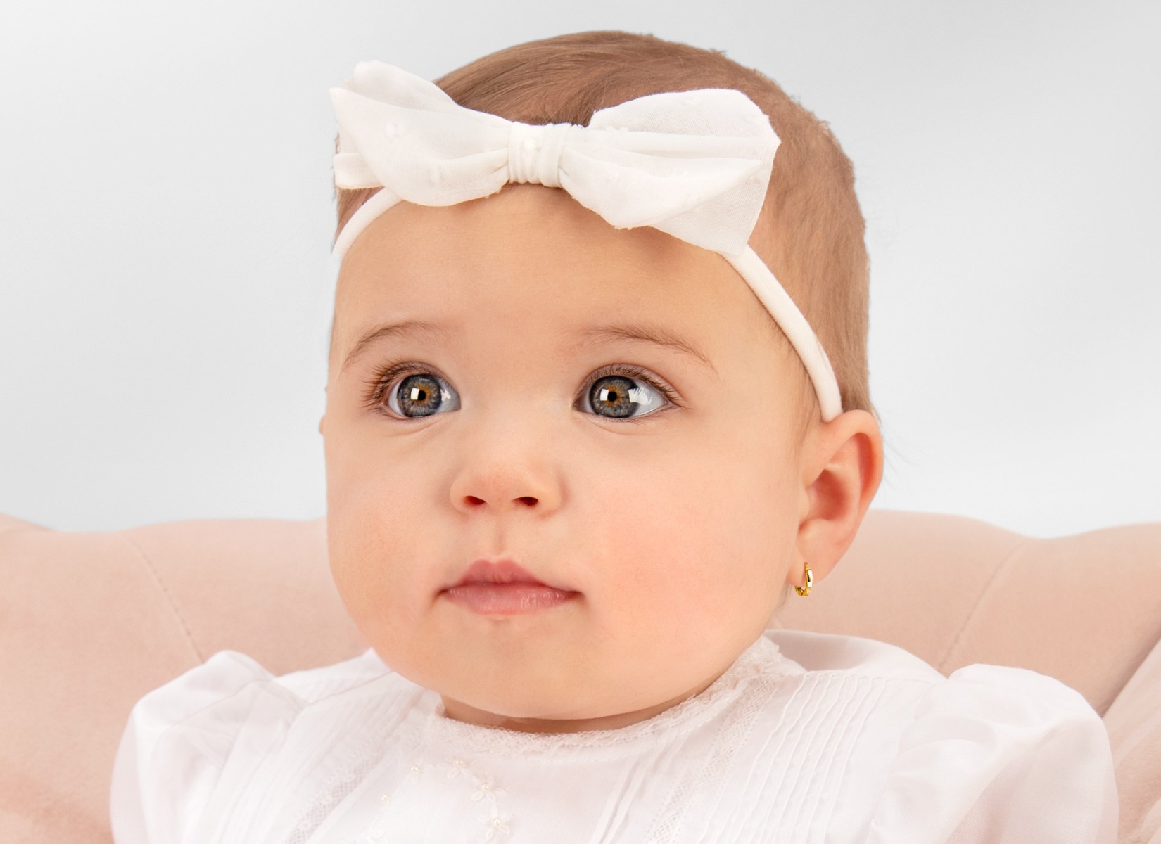Earring Shown on Infant Girl