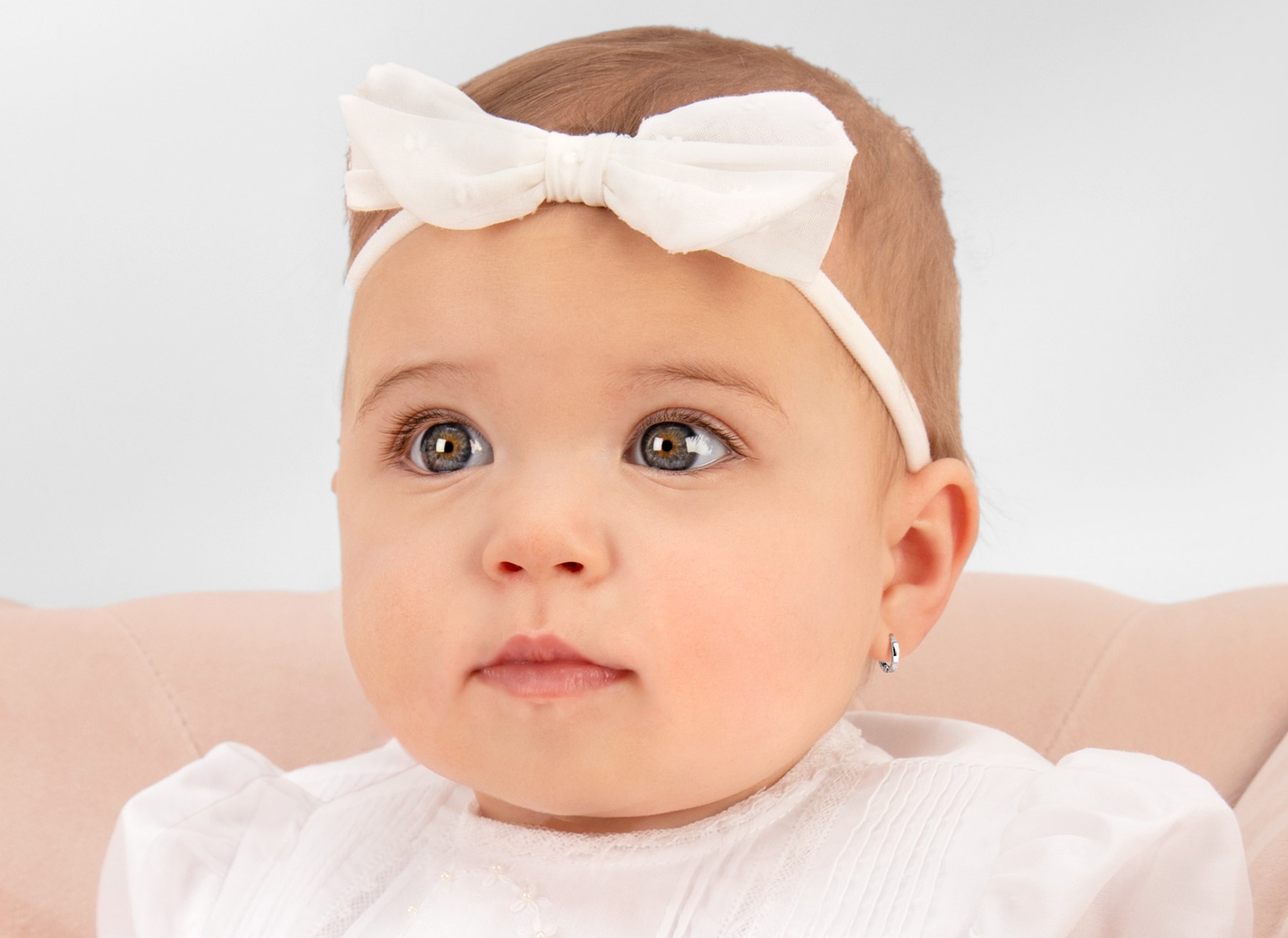 Earring Shown on Infant Girl