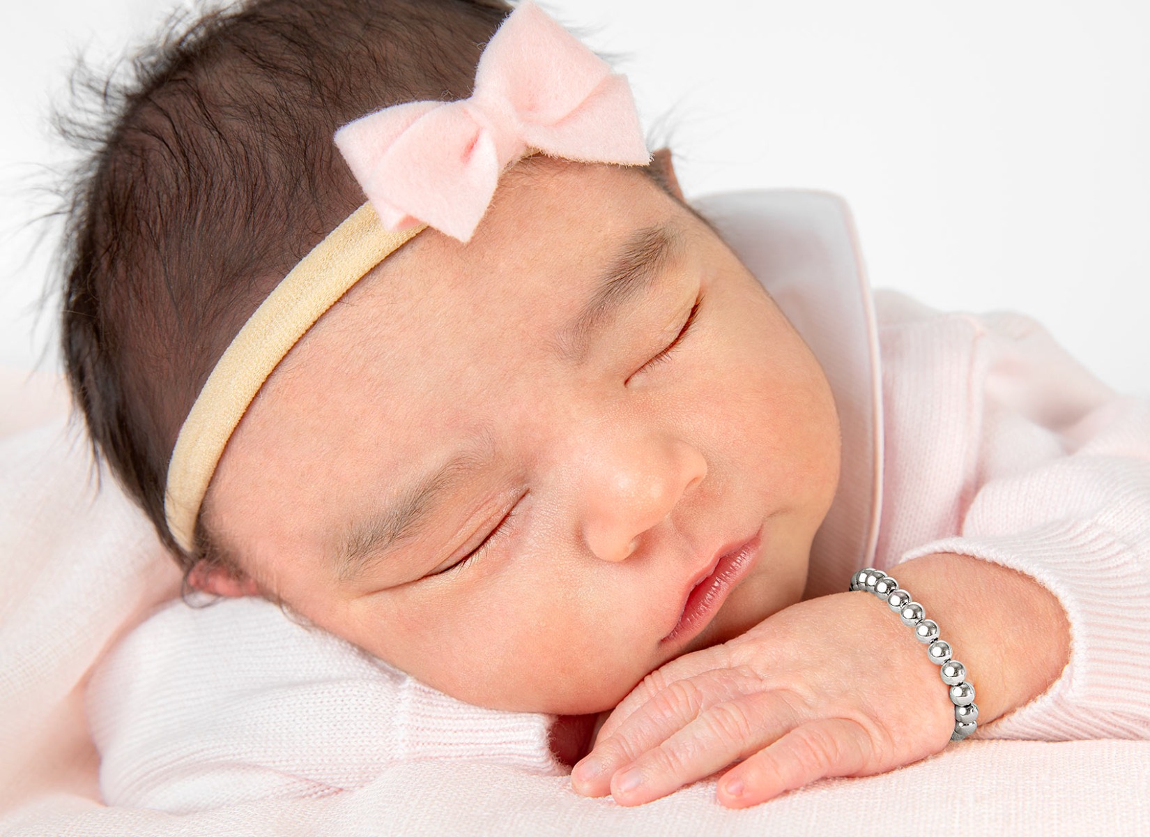 Example Bracelet Shown on Newborn Girl