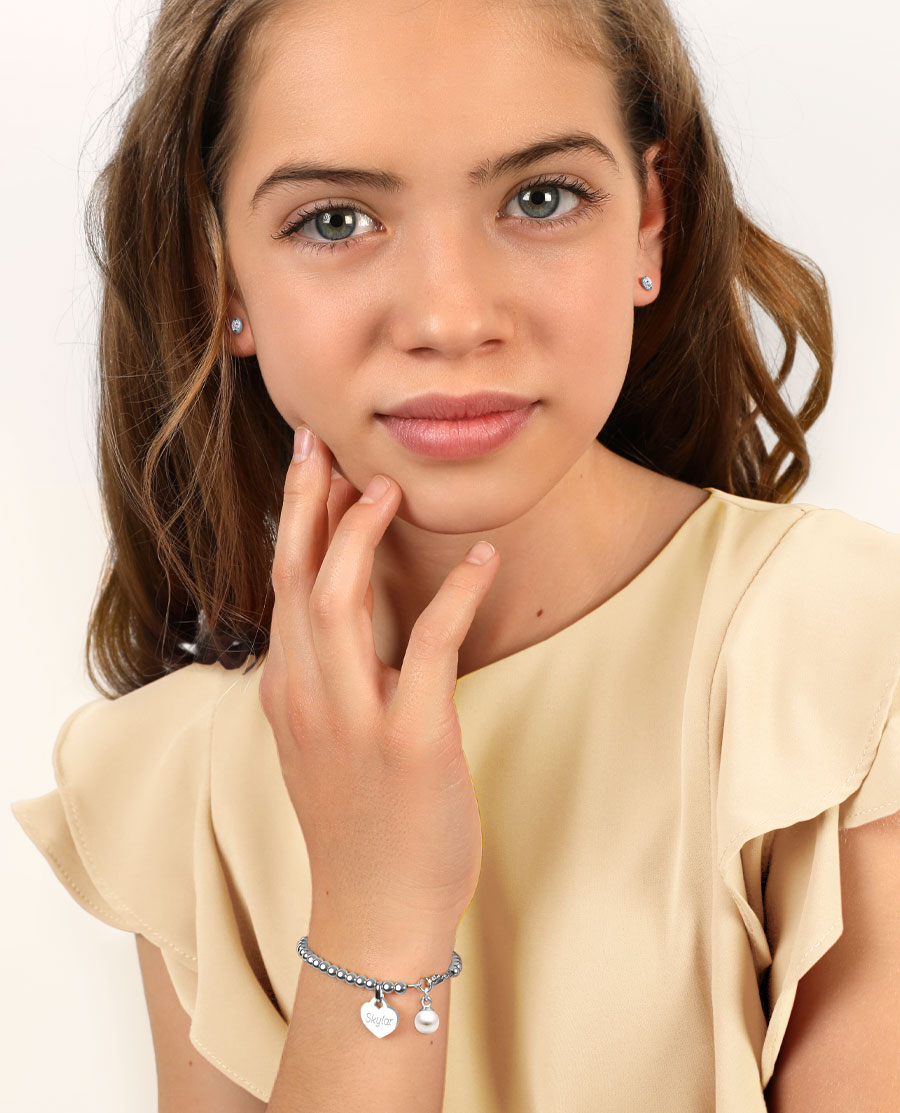 Girl wearing Tiny Blessings Jewelry